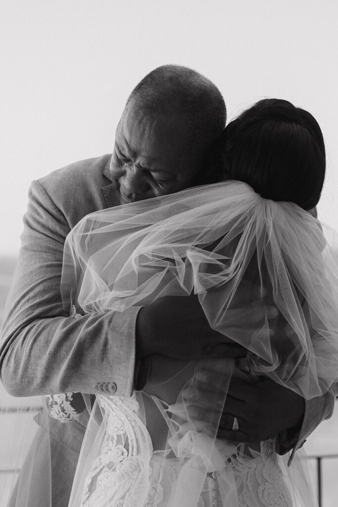 emotional first look with father of the bride
